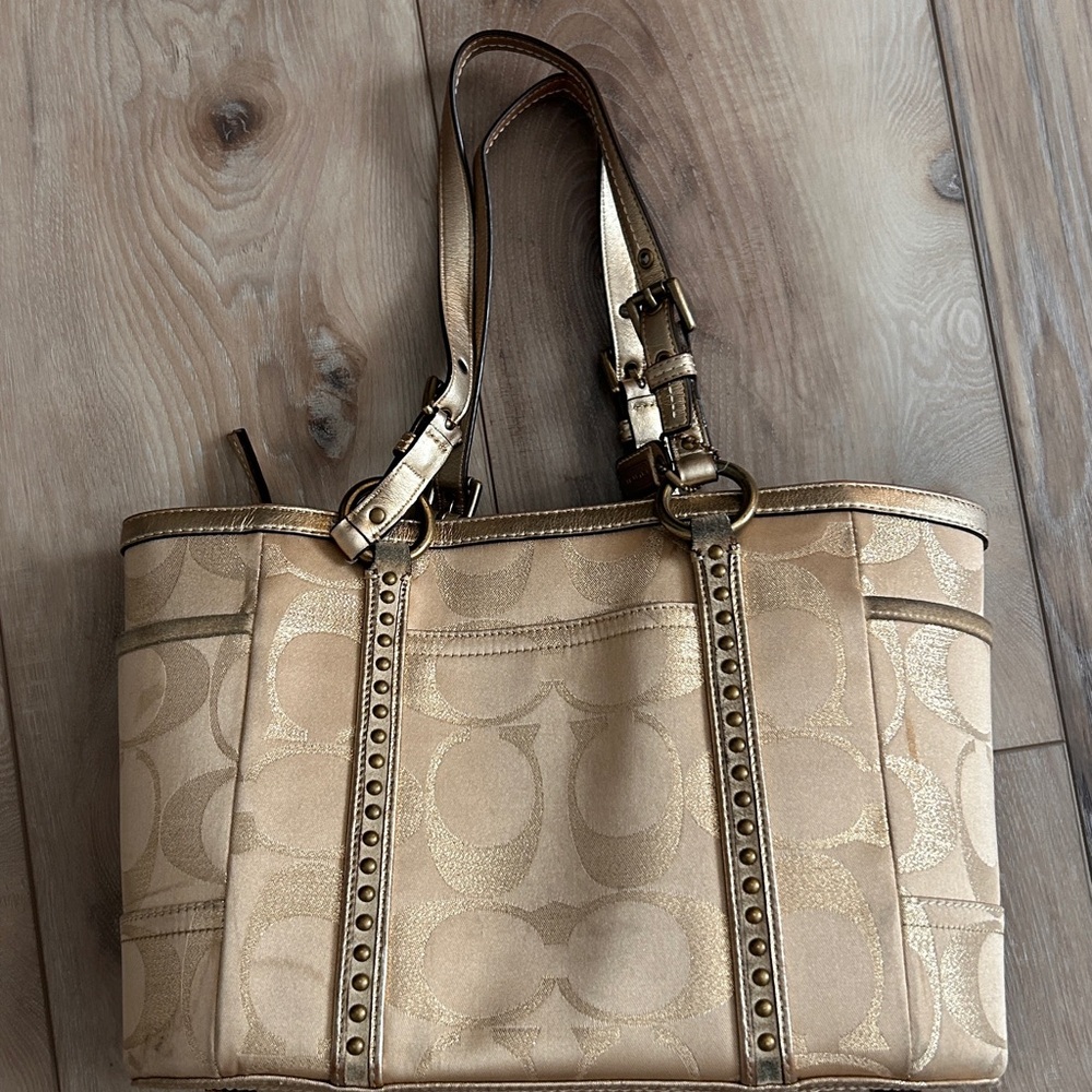 Coach Gold Signature Tote With Leather Accents.